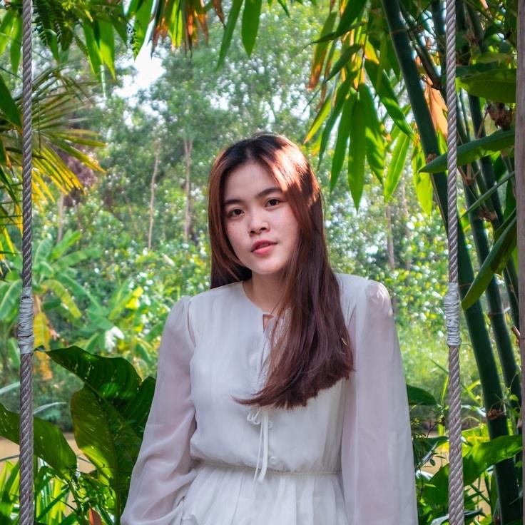 Alex Parker, Lead Design Curator at HighlandHollowForest, reviewing corporate floral arrangements